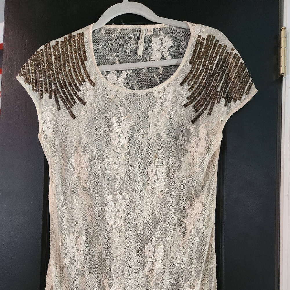 Sheer Top with gold detail on sleeve Petticoat Alley
